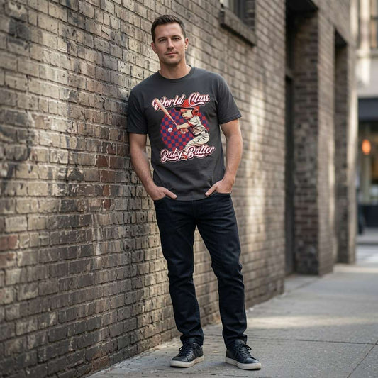 Man in black World Class Baby Batter tee against brick wall, cheeky funny mens baseball pub tee