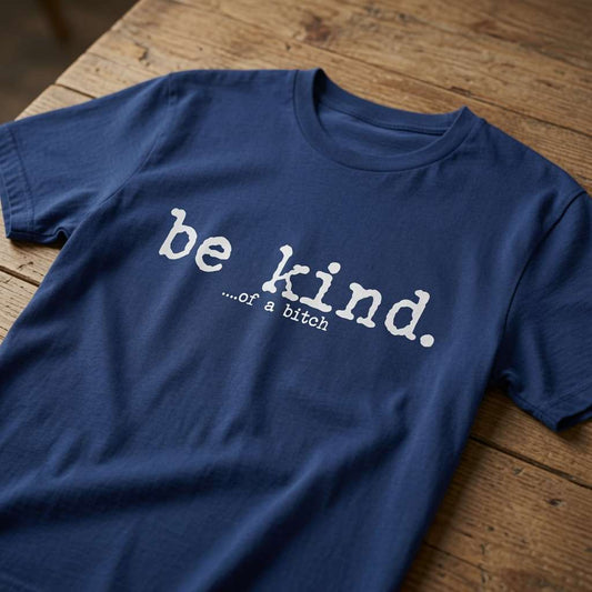 Blue Be Kind of a Bitch t-shirt on wood, sarcastic relatable funny statement ladies shirt