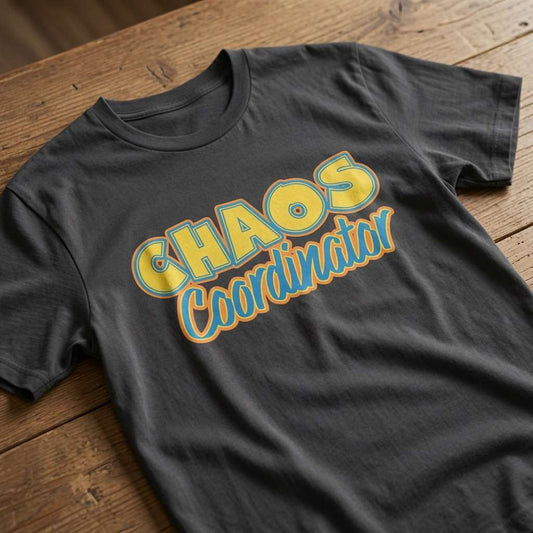 Black Chaos Coordinator slogan t-shirt on wood, fun relatable mum slogan shirt