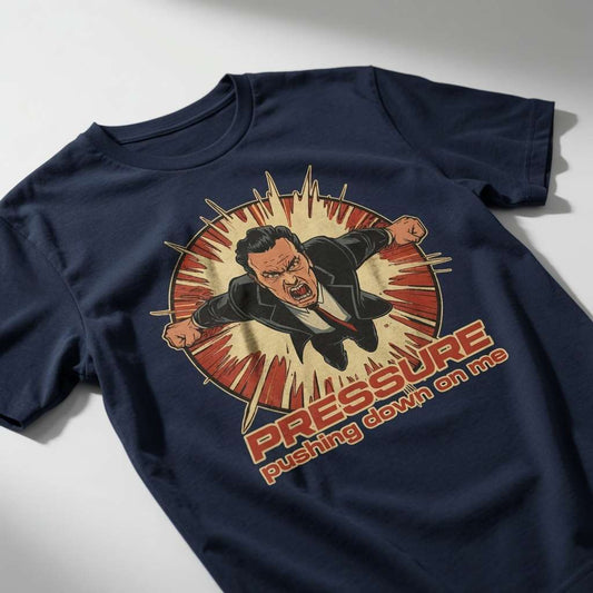 Navy Under Pressure t-shirt laid flat showing the full stressed businessman graphic and “Pressure pushing down on me” text, original mens relatable design that every cheeky lad will claim