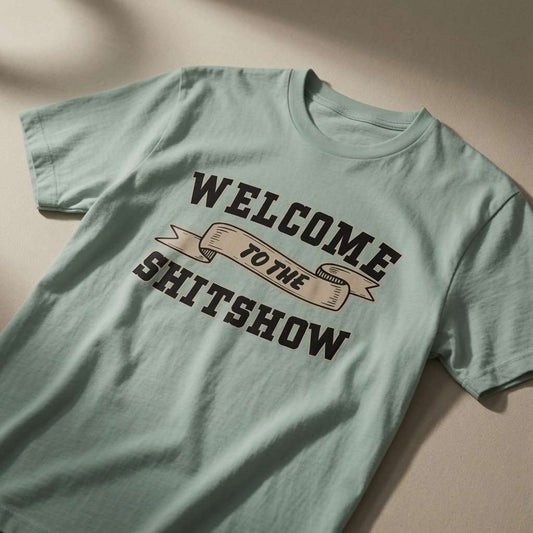 Aloe Welcome to the Shitshow t-shirt laid flat showing the full banner slogan, funny rude but relatable mens slogan design that every cheeky lad will claim