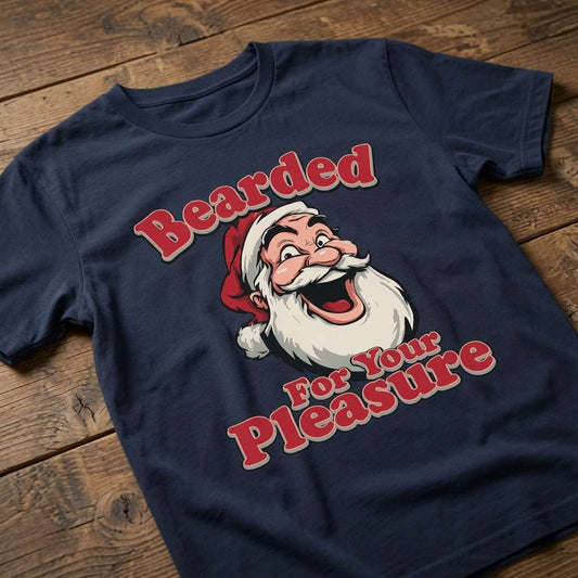 Navy Bearded For Your Pleasure t-shirt laid flat on a wooden surface showing the full laughing Santa graphic, Christmas pub banter design that every cheeky lad will claim