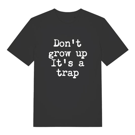 Black Don't Grow Up T-shirt flat lay with "Don't grow up It's a trap" slogan graphic