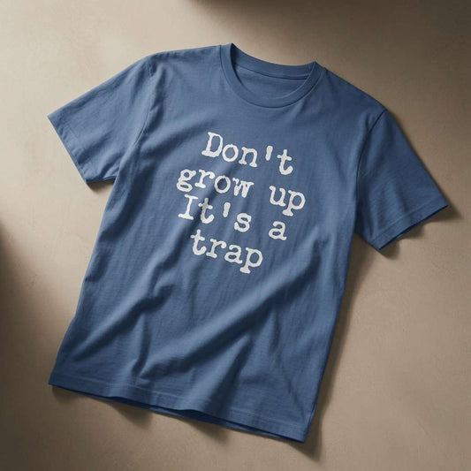 Bright blue Don’t Grow Up It’s a Trap t-shirt, advice statement tee