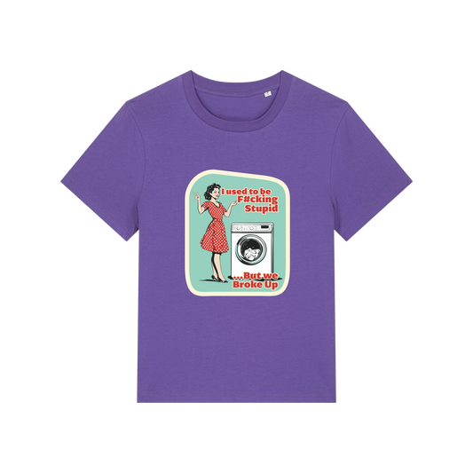 purple funny offensive t-shirt with the graphic of a retro housewife stood next to a washing machine and the slogan 'i used to be fucking stupid .. but we broke up'