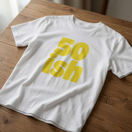 White 50 ish t-shirt on wood with bold yellow text, ladies 50th birthday gift