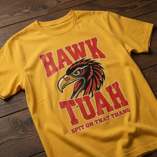 Yellow Hawk Tuah Spit on That Thang t-shirt on wood featuring hawk head graphic, mens witty viral meme