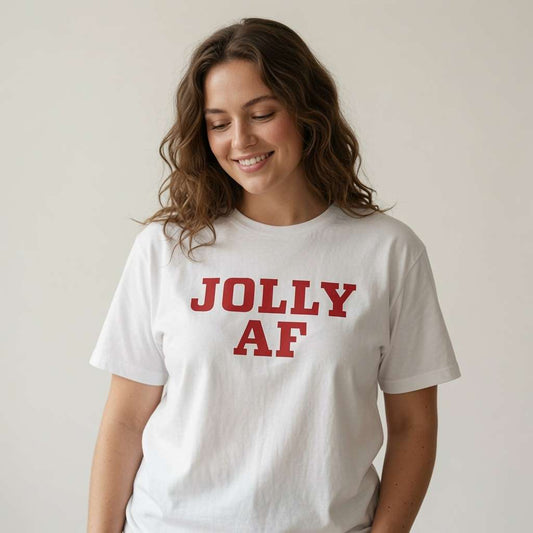 Woman looking down smiling in white Jolly AF t-shirt, fun ladies classic christmas day pub