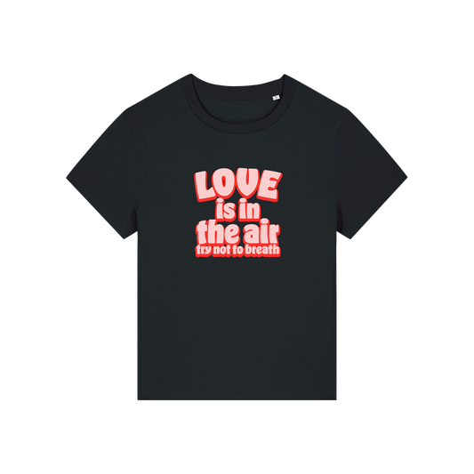 Black slogan t-shirt with red text 'LOVE is in the air try not to breathe'