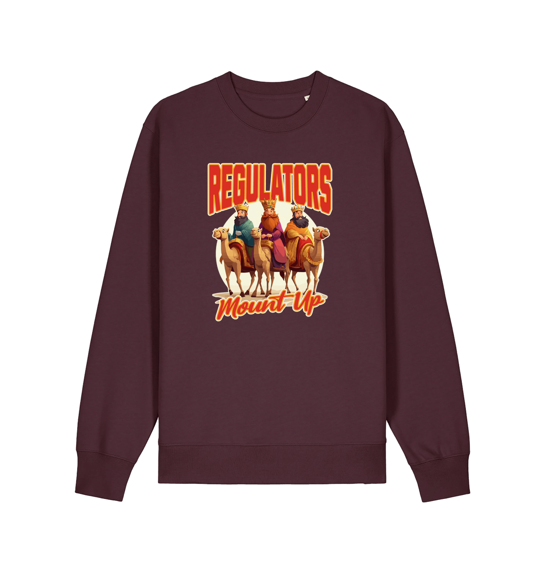 red brown christmas sweater with the graphic of three wise men on horses and the slogan 'regulators mount up'