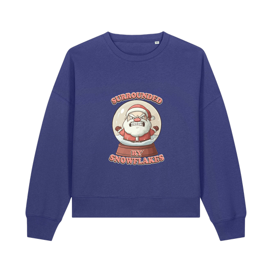 blue christmas sweater with the graphic of santa inside a snowglobe and the slogan 'surrounded by snowflakes'