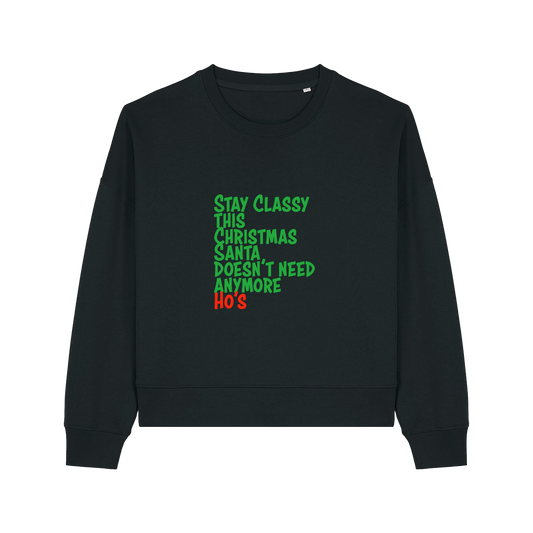 black christmas sweater with the slogan 'stay classy this christmas santa doesn't need anymore ho's'