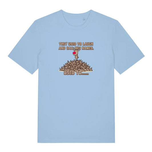 light blue xmas t-shirt with the graphic of rudolph stood on top of a pile of reindeer and the slogan 'they used to laugh and call me names .. used to'