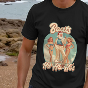 Man wearing a black funny Christmas t shirt with a retro-style graphic of Santa between two women in bikinis, reading 
