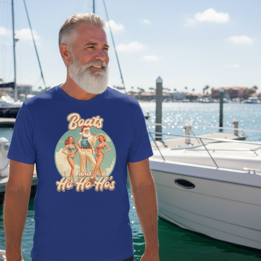 man wearing a funny santa t-shirt stood at a marina