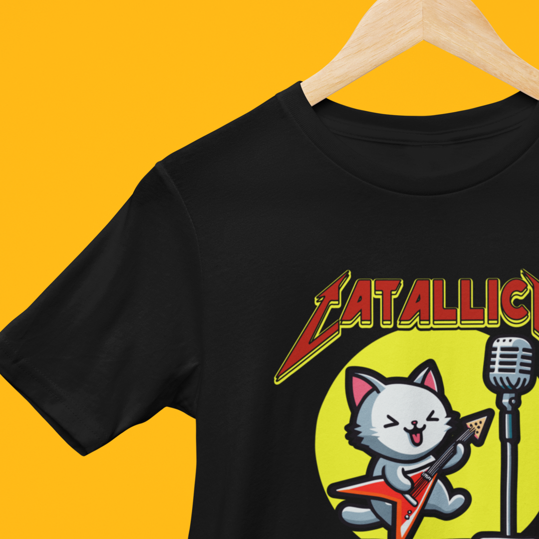 Black t-shirt with with the graphic of a cat playing a guitar and the text 'catallica' on a yellow background