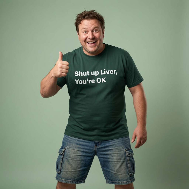 Man laughing and giving a thumbs up while wearing a glazed green Shut up Liver, You’re OK t-shirt, funny and witty pub banter design