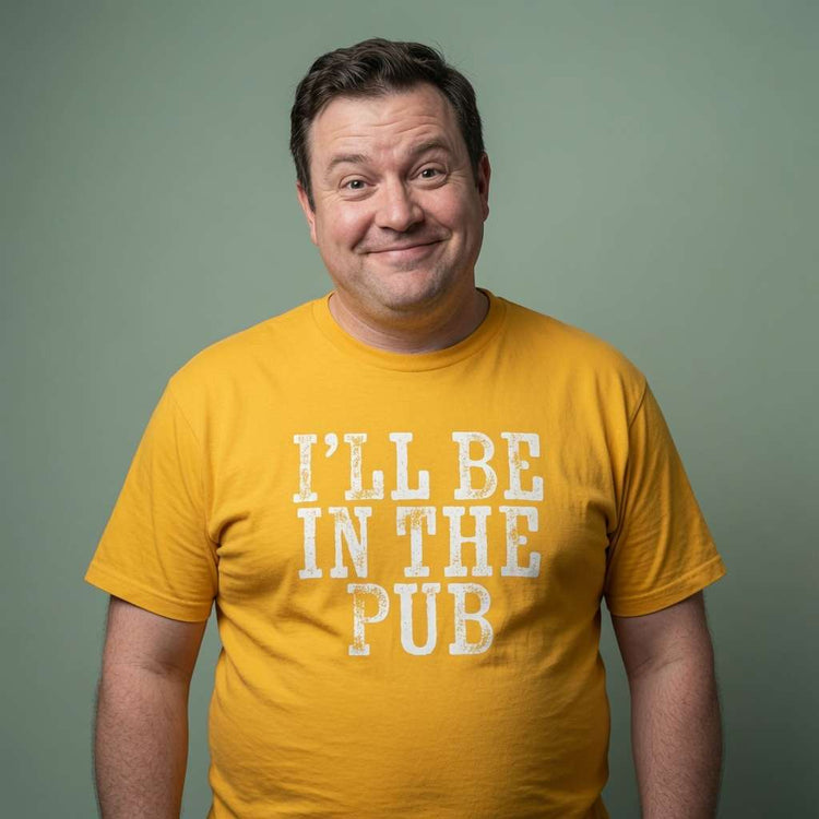 Man with slight smile in yellow I’ll Be in the Pub t-shirt, mens ultimate dad gift slogan