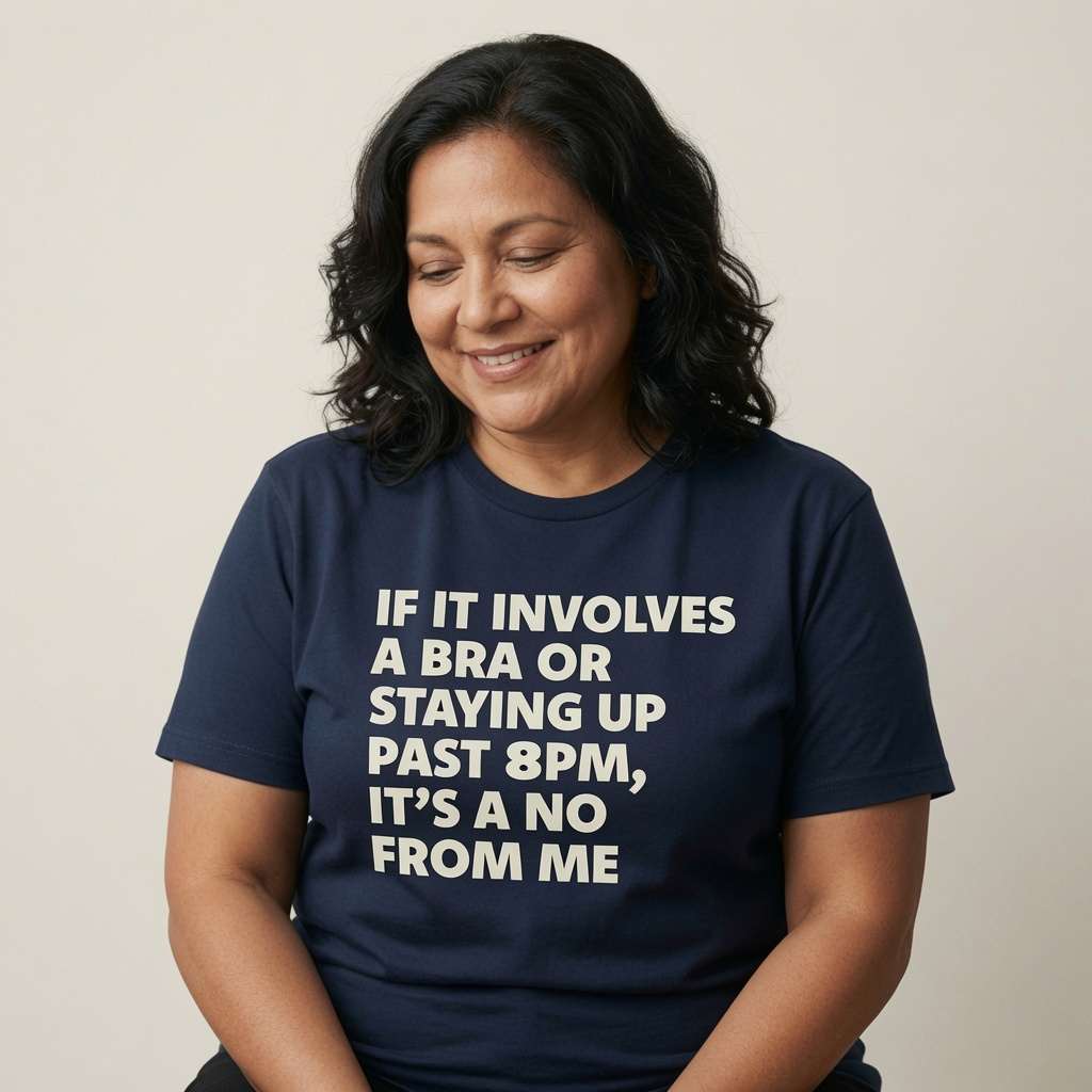 Woman looking down smiling in navy If It Involves a Bra or Staying Up Past 8PM It’s a No From Me tee, fun witty relatable ladies slogan
