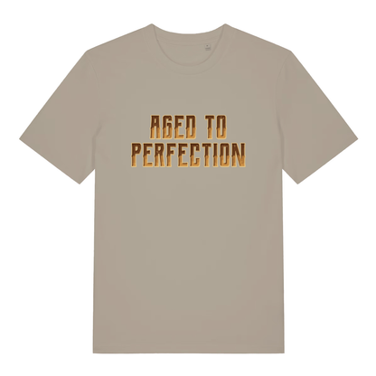 Beige "Aged to Perfection" witty sarcastic t-shirt flat lay, funny age related slogan organic cotton tee UK made