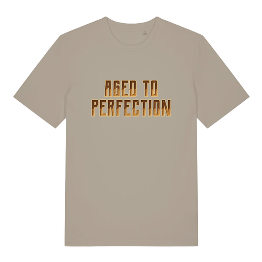 Beige "Aged to Perfection" witty sarcastic t-shirt flat lay, funny age related slogan organic cotton tee UK made