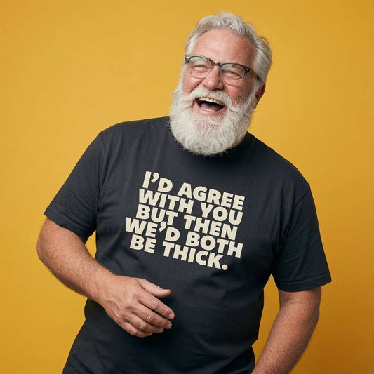 Older man laughing with one hand near his stomach while wearing a black I’d Agree With You But Then We’d Both Be Thick t-shirt, funny cheeky witty roast slogan design full of pure attitude that every cheeky lad will claim