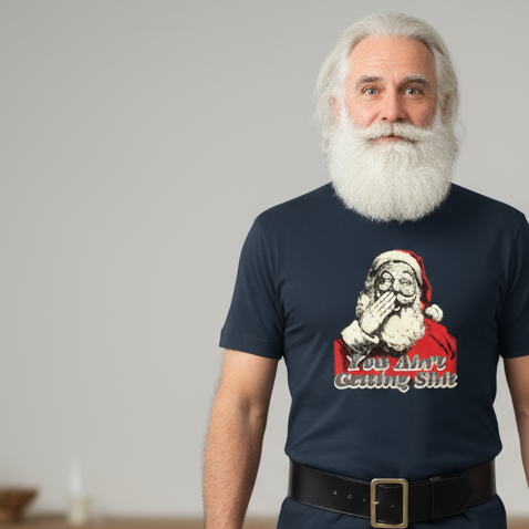 Father Christmas wearing a navy blue funny Santa t-shirt with a graphic of Santa Claus and text, against a plain background.