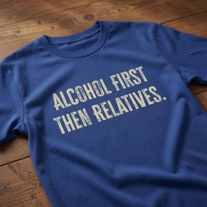 Blue Alcohol First Then Relatives slogan t-shirt on wood, funny xmas day mens tee