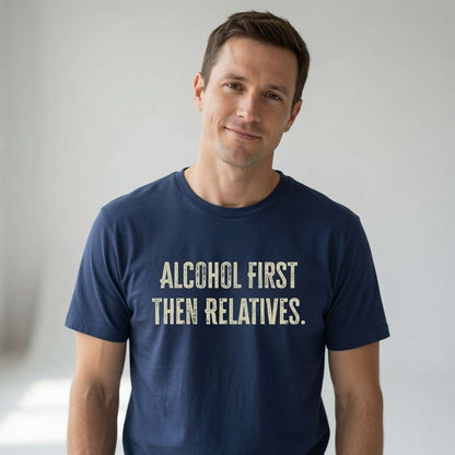 Man in navy Alcohol First Then Relatives t-shirt, fun witty festive xmas slogan gift