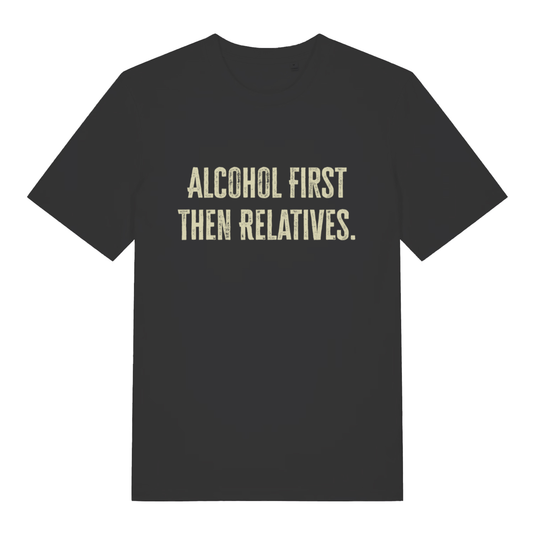 Black women's "Alcohol First Then Relatives" funny Christmas t-shirt flat lay, cheeky Xmas slogan organic cotton ladies tee printed in UK
