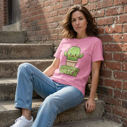 Woman in pink Annoying Prick cactus tee sat on steps, witty funny plant graphic gift for her