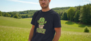 Man wearing a dark Funny T-shirt with a cartoon cactus character and the words 