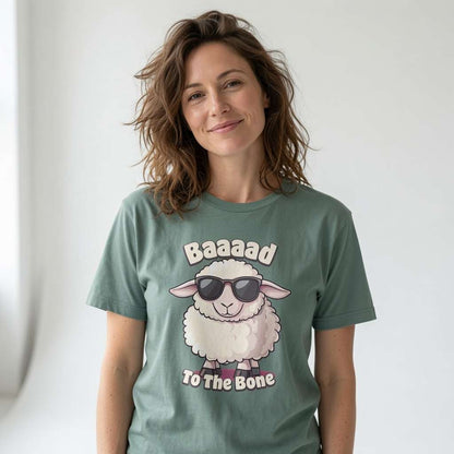 Woman in green Baaaad To The Bone sheep tee, humorous ladies animal pun tee