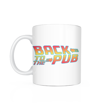 A white ceramic coffee mug featuring a retro-style 'BACK TO THE PUB' graphic in yellow, orange, and blue gradient lettering, shown on a clean white background with a soft reflection.