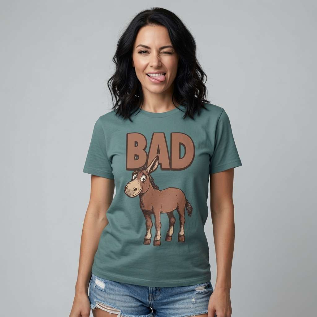 Woman in green Bad Ass donkey tee sticking tongue out, funny unique animal ass graphic tee
