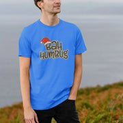 Man wearing a blue Christmas T-shirt that reads 