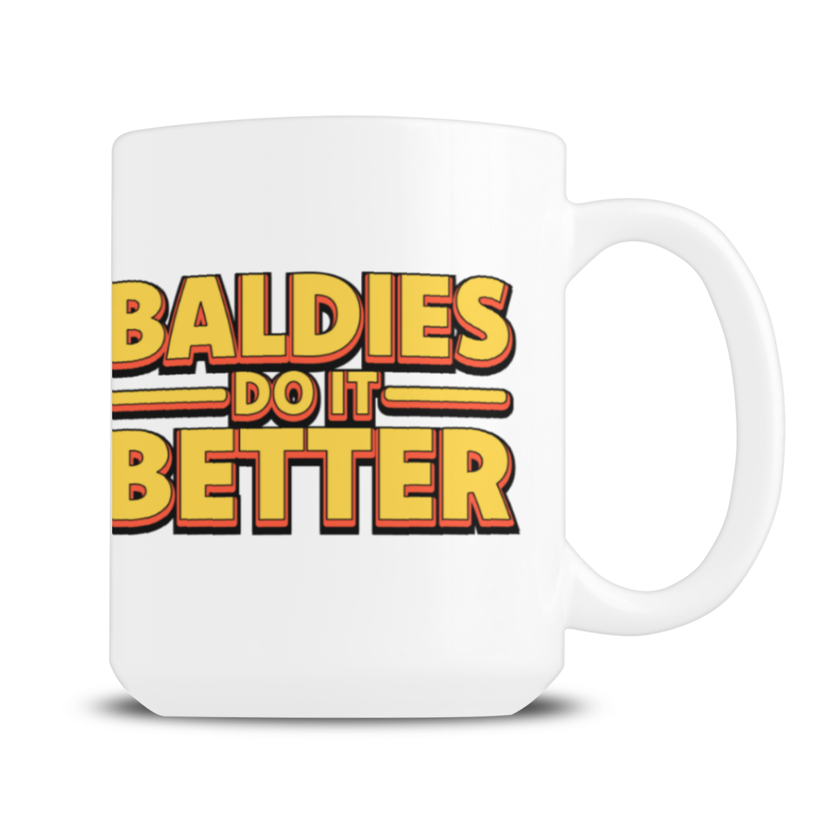 White ceramic mug with a large handle and bold retro lettering reading “Baldies Do It Better” in yellow, orange, and black; playful, confident tone.