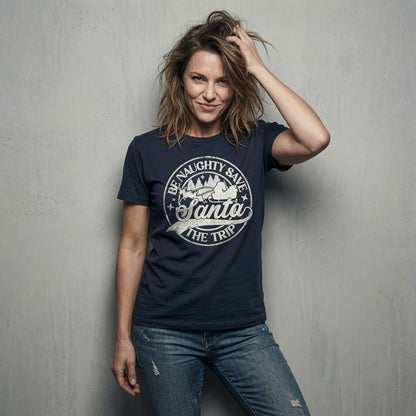 Woman in navy Be Naughty Save Santa The Trip t-shirt, sarcastic cheeky xmas slogan tee