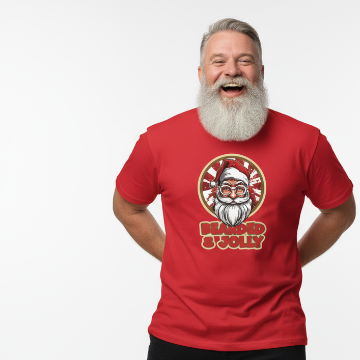 Man wearing a red Christmas slogan t-shirt with a Santa Claus graphic and 'Merry Jolly' text on a white background