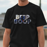 Black movie t-shirt with 'BEEP BOOP' slogan worn by a person, blurred background