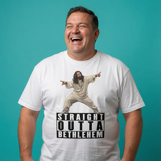 Man laughing while wearing a white Straight Outta Bethlehem t-shirt, offensive mens funny alternative christmas graphic design that every cheeky lad will claim