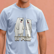 Light blue funny graphic t-shirt with cartoon polar bears and 'Bi Polar' slogan, against a peach background