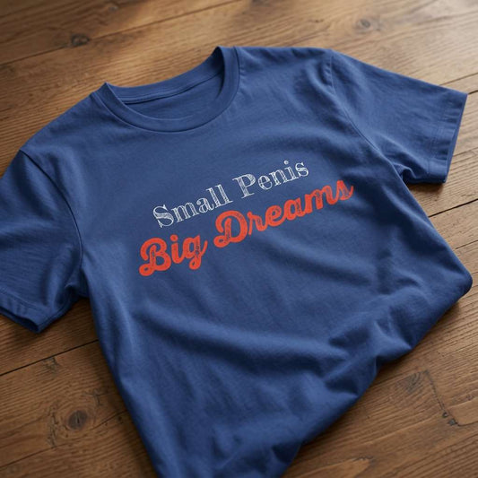 Blue Small Penis Big Dreams slogan t-shirt on wood, fun rude crude pub banter mens tee