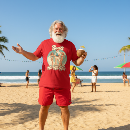 Man in red funny Christmas t shirt, with the funny slogan "Boats and ho, ho, ho's" and shorts holding a coconut on a beach with people in the background.