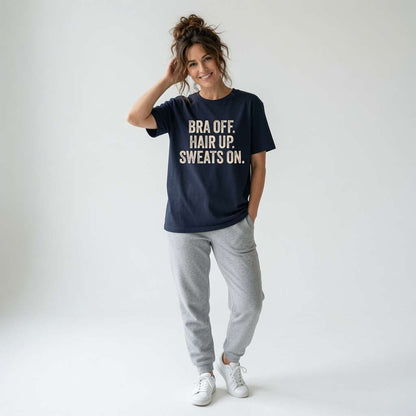 Woman in navy Bra Off Hair Up Sweats On t-shirt, cheeky fun relatable statement ladies shirt