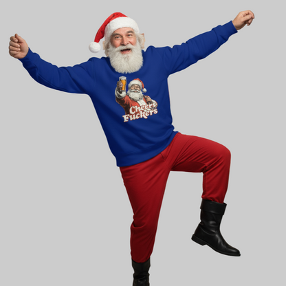 Person wearing a blue Rude Santa sweater with a graphic design and red pants on a gray background