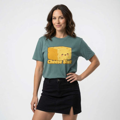 Woman in green Cheese S**t tee with hand on hip, funny rude cheeky cheese graphic gift