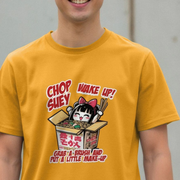 Person wearing a mustard yellow music t-shirt with a Japanese cartoon character and chop suey slogan design.
