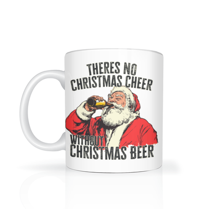 White ceramic mug featuring Santa Claus drinking a beer and the phrase “There’s no Christmas cheer without Christmas beer.” Humorous, festive holiday design.