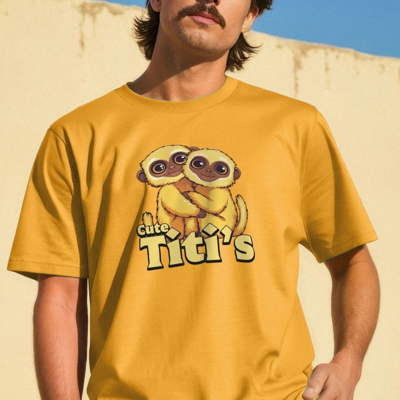 Person wearing a mustard yellow funny animal t-shirt with cartoon titi monkeys and the slogan Cute Titis.